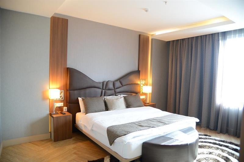 Titanic Hotel & Spa Sulaymaniyah Екстер'єр фото A bedroom at the hotel